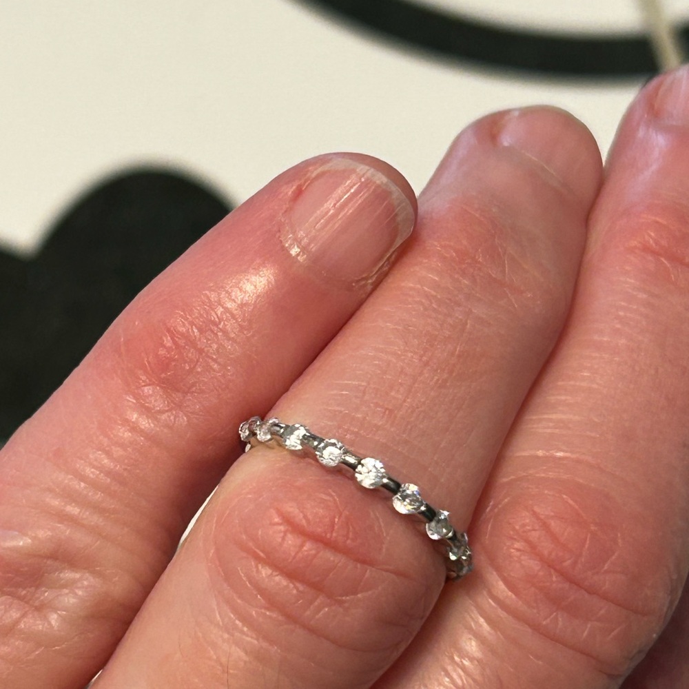 Sterling silver and cubic zirconia, 1/2 band, size US 4.